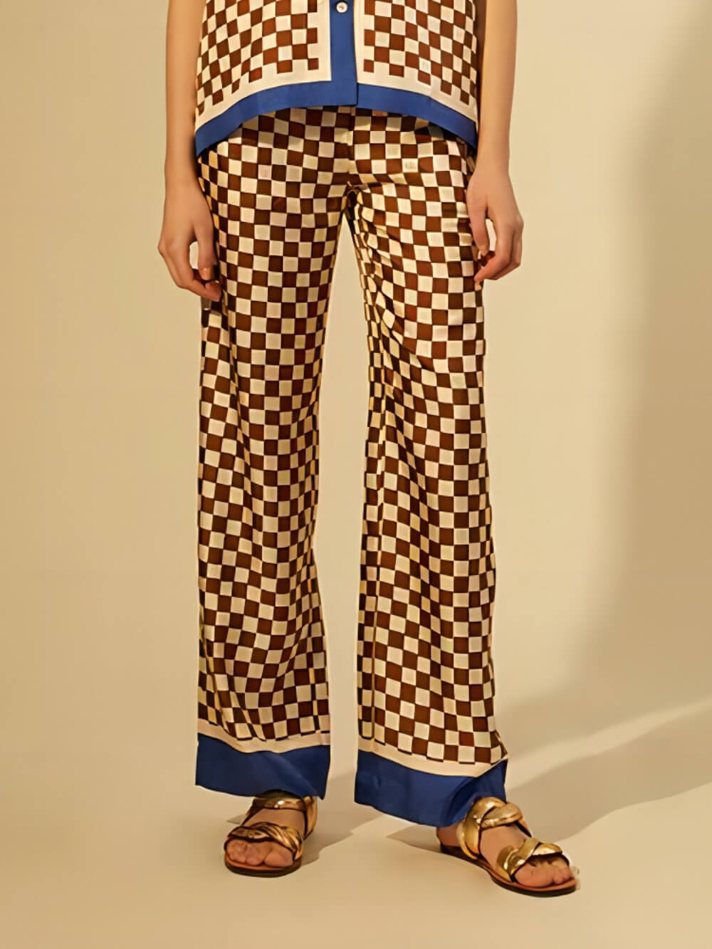 Unieke losse broekset met schaakbordprint, blauwe strepen en patchwork