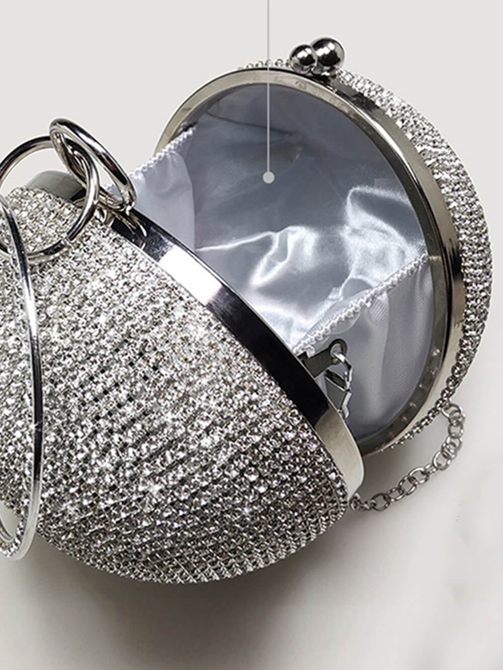 Bolsa de pulso redonda com strass e cristal