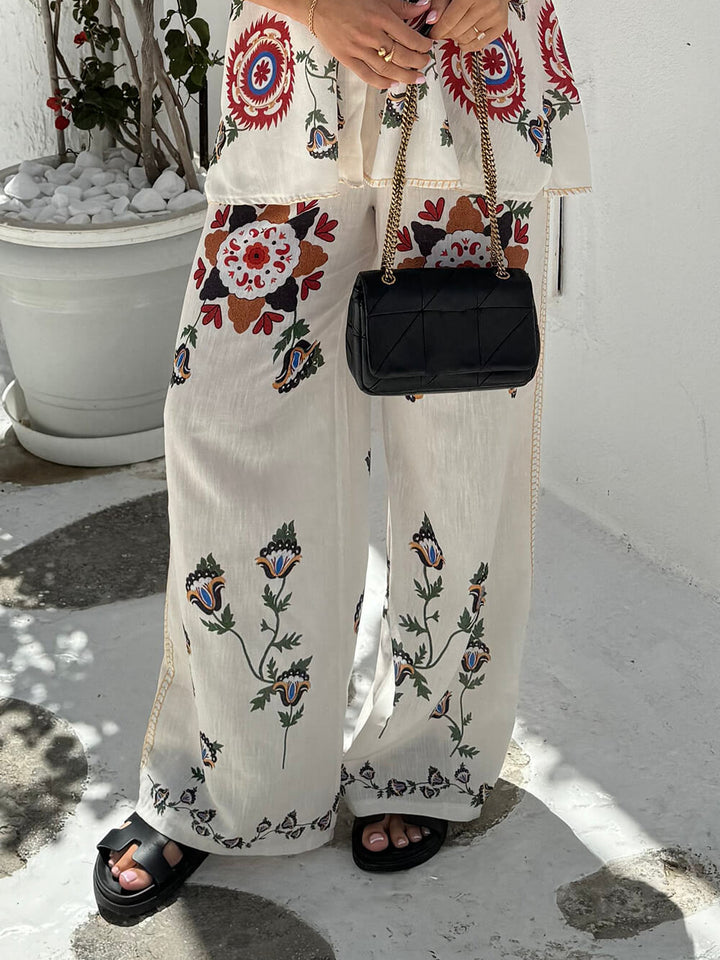Unieke en prachtige etnische bloemenprint broek met elastische taille en wijde pijpen