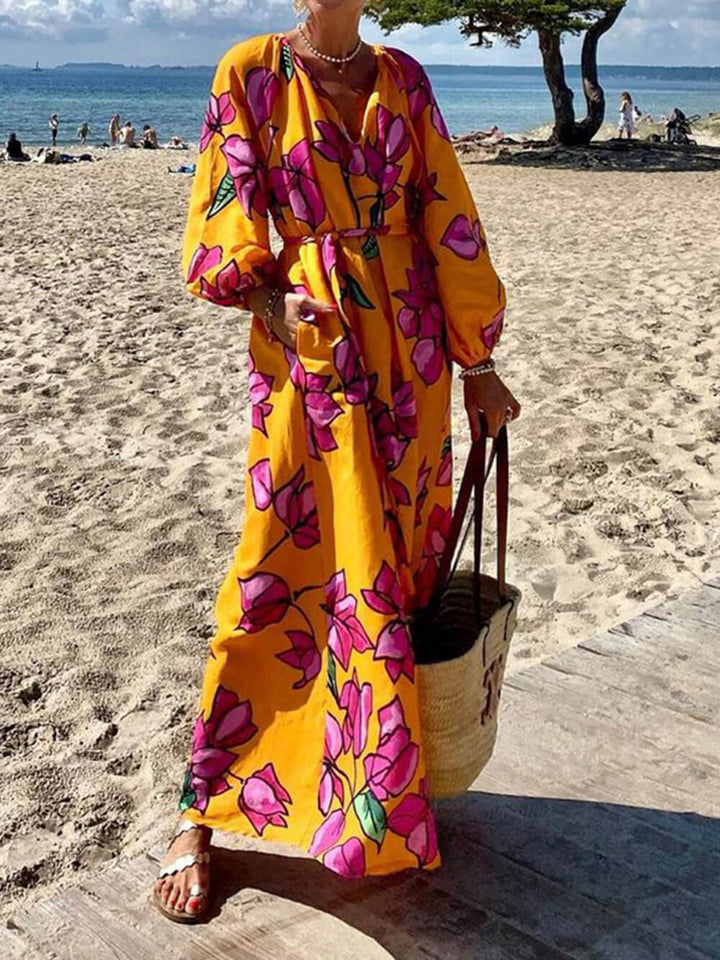 Vestidos de praia de férias estampados com decote em V da moda