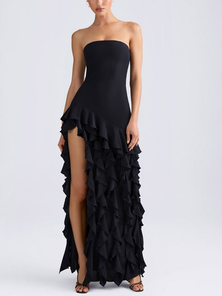 Axelbandslös klänning med volang i svart