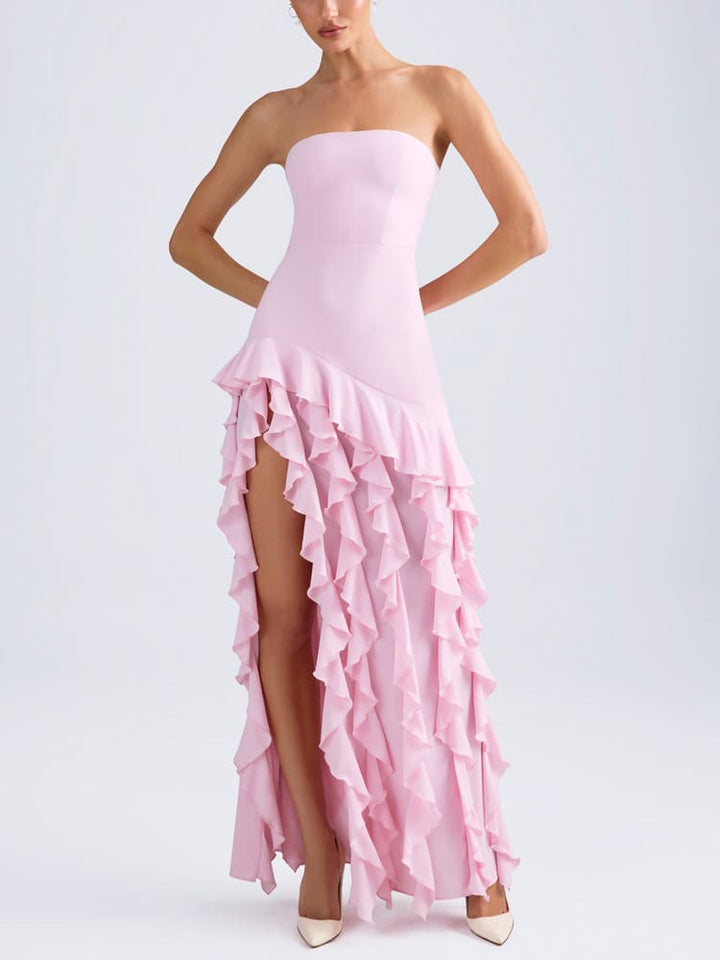 Axelbandslös klänning med volang i rosa
