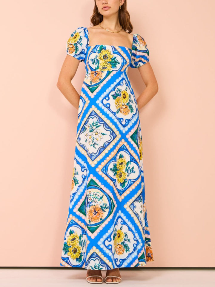 Vestido maxi manga bufante em floral azul