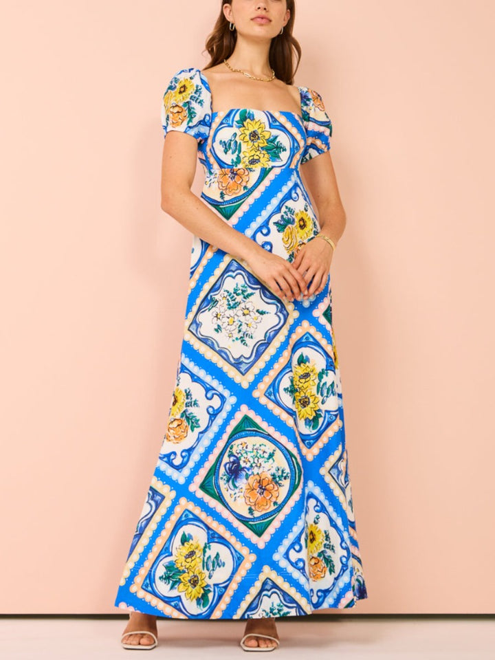 Maxi-jurk met pofmouwen in azuurblauwe bloemen