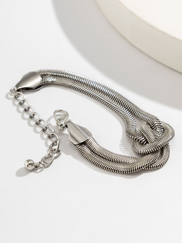 Bracelet chaîne en os de serpent enroulé
