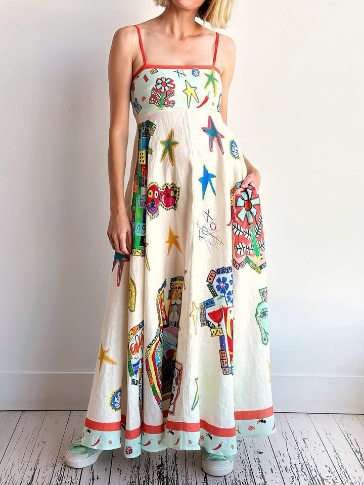 Vestido midi largo con vuelo y tirantes con estampado de grafiti de Unique